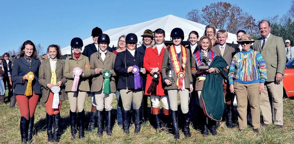 First Field 13 & Over Champion Heather Feconda (holding green cooler) of Loudoun Fairfax Hunt, with rosette winners and adult VIPs. Photos by Lauren R. Giannini