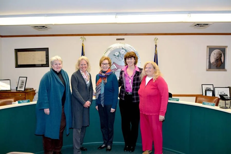 Cherry Blossom Breast Cancer Foundation leaders Stephanie Knapp, Becky Hoecker, and Kim O’Donnell thanked the Town Council on Jan. 14 for its $2000 donation to help local women. Mayor Betsy Davis and Vice-Mayor Darlene Kirk are on the left and right.