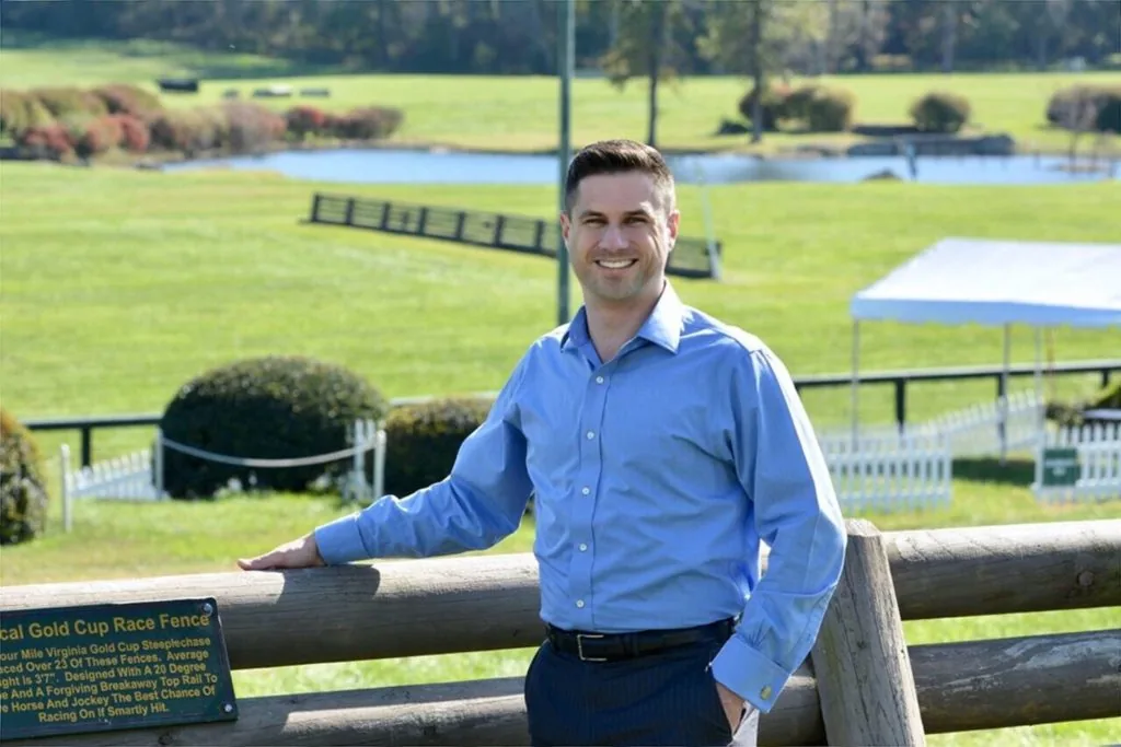 U-40 Chair Nate Chambers with the hallowed Gold Cup course in the background.Photo by Kira Topeka, Director of Marketing, Great Meadow Foundation